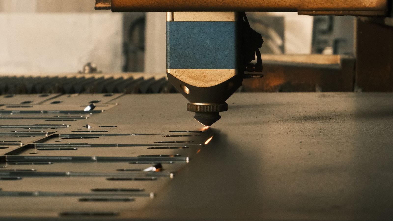 Fiber laser cutter cutting sheet metal